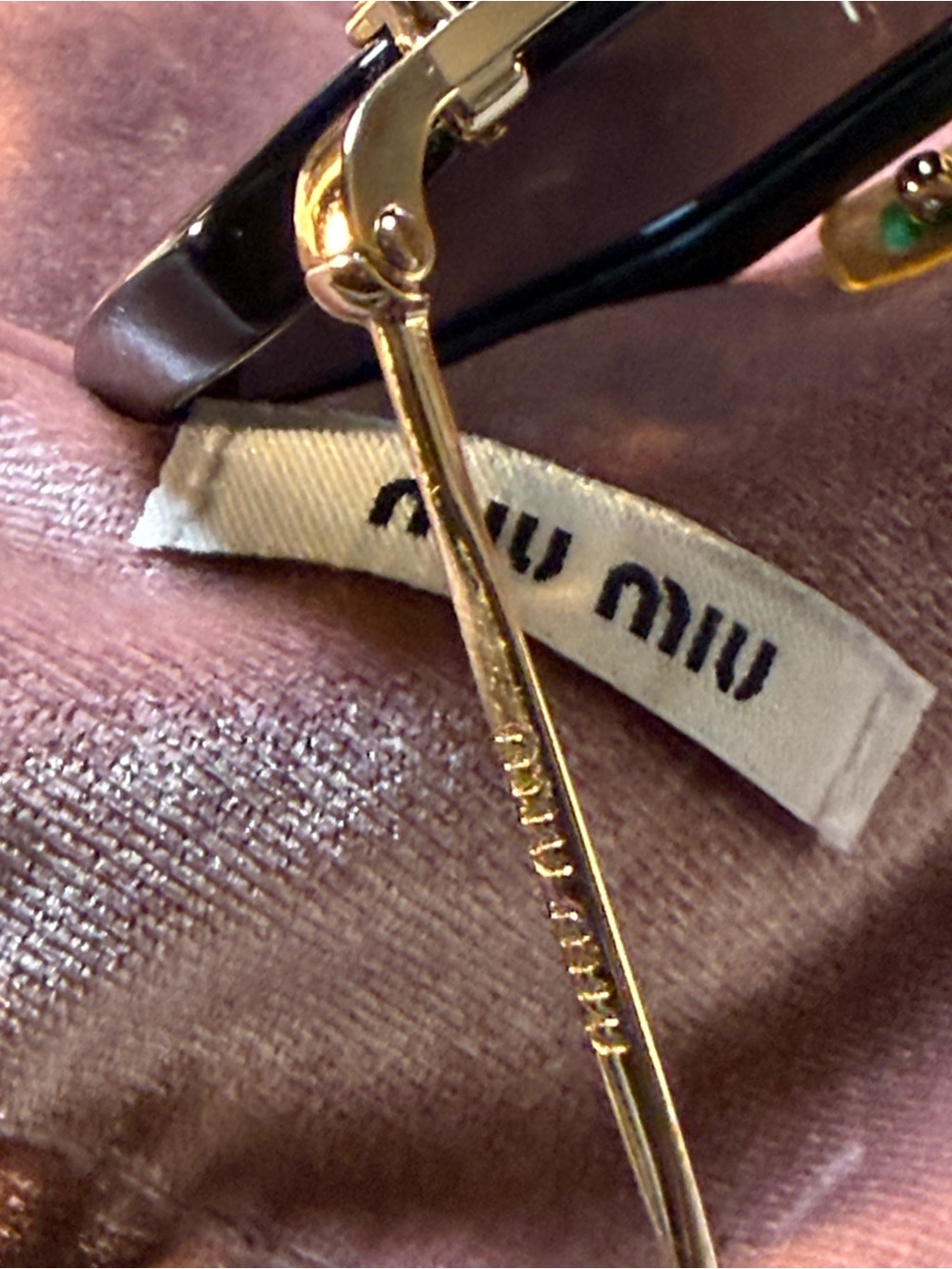 Miu Miu Black Cat-Eye Sunglasses with Gold Trim - Picture 3 of 12